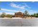 Two-story house with a three-car garage and desert landscaping at 6165 Smarty Jones Ave, Las Vegas, NV 89131