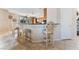 Kitchen island with seating for two at 6165 Smarty Jones Ave, Las Vegas, NV 89131