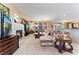 Living room with a sectional sofa and fireplace at 6165 Smarty Jones Ave, Las Vegas, NV 89131