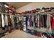 Large walk-in closet with ample shelving and hanging space at 6165 Smarty Jones Ave, Las Vegas, NV 89131