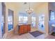 Charming breakfast nook with built-in cabinetry and access to backyard at 6185 N Conquistador St, Las Vegas, NV 89149