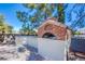 Outdoor brick pizza oven with counter space for entertaining at 6185 N Conquistador St, Las Vegas, NV 89149