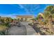 Landscaped backyard with patio and casita at 7079 Mountridge Dr, Las Vegas, NV 89110