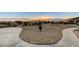 Landscaped backyard with gravel and pathway at 7079 Mountridge Dr, Las Vegas, NV 89110