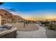 Hot tub and pathway in desert landscape at 7079 Mountridge Dr, Las Vegas, NV 89110