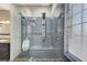 Spa-like shower with multiple shower heads and built-in seating at 7079 Mountridge Dr, Las Vegas, NV 89110