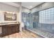 Spa-like bathroom with a large walk-in shower and modern vanity at 7079 Mountridge Dr, Las Vegas, NV 89110