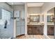 Elegant bathroom with double vanity, large shower, and modern fixtures at 7079 Mountridge Dr, Las Vegas, NV 89110