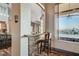 Kitchen bar with stone backsplash and view at 7079 Mountridge Dr, Las Vegas, NV 89110