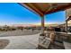 Outdoor kitchen and seating area at 7079 Mountridge Dr, Las Vegas, NV 89110