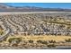 Aerial view of community with golf course at 7517 Lintwhite St, North Las Vegas, NV 89084