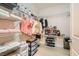 Large walk-in closet with shelving and drawers for ample storage at 7517 Lintwhite St, North Las Vegas, NV 89084