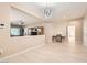 Open dining area with light hardwood floors and view of living room at 7517 Lintwhite St, North Las Vegas, NV 89084