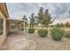 Relaxing patio with brick pavers and a view of the golf course at 7517 Lintwhite St, North Las Vegas, NV 89084