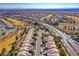 Aerial view of community with solar panels and golf course at 7568 Lily Trotter St, North Las Vegas, NV 89084