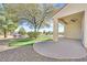 Covered patio with ceiling fan, overlooking a landscaped backyard at 7568 Lily Trotter St, North Las Vegas, NV 89084