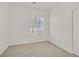 Well-lit bedroom featuring a window and neutral walls at 7568 Lily Trotter St, North Las Vegas, NV 89084