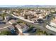 Community overview showcasing numerous houses and surrounding landscape at 7909 Dutch Canyon Ct, Las Vegas, NV 89131