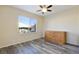 Bedroom with dresser and large window at 7909 Dutch Canyon Ct, Las Vegas, NV 89131