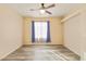 Bedroom featuring wood-look floors and ceiling fan at 7909 Dutch Canyon Ct, Las Vegas, NV 89131