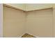 Large walk-in closet with wood shelving at 7909 Dutch Canyon Ct, Las Vegas, NV 89131