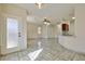 Kitchen and living area with tile floors at 7909 Dutch Canyon Ct, Las Vegas, NV 89131