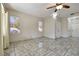 Spacious living room featuring tile flooring and lots of natural light at 7909 Dutch Canyon Ct, Las Vegas, NV 89131