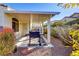 Backyard patio with covered pergola, grill, and gravel landscaping at 7909 Dutch Canyon Ct, Las Vegas, NV 89131