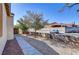 Landscaped side yard with a walkway, providing access to the house at 7909 Dutch Canyon Ct, Las Vegas, NV 89131