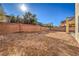 Spacious backyard with gravel and block wall at 7923 Sleeping Lily Dr, Las Vegas, NV 89178