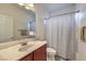 Clean bathroom with a shower/tub combo and updated vanity at 7923 Sleeping Lily Dr, Las Vegas, NV 89178