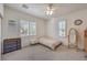 Well-lit bedroom with a full-size bed and plenty of closet space at 7923 Sleeping Lily Dr, Las Vegas, NV 89178