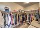 Large walk-in closet with ample shelving and hanging space at 7923 Sleeping Lily Dr, Las Vegas, NV 89178