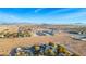 Aerial view of a house and surrounding desert landscape at 8365 Hauck St, Las Vegas, NV 89139