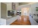 Bright and airy entryway with hardwood floors and a view of the living room at 8365 Hauck St, Las Vegas, NV 89139