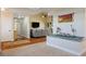 Hallway featuring hardwood floors, a large carpet, and access to other living spaces at 8365 Hauck St, Las Vegas, NV 89139