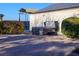 Backyard hot tub with gray stone exterior and steps for easy access at 8365 Hauck St, Las Vegas, NV 89139