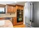 Spacious kitchen featuring built-in appliances, custom cabinetry, and granite countertops at 8365 Hauck St, Las Vegas, NV 89139