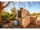 Outdoor kitchen featuring stone construction, built in storage, and ample counter space for entertaining at 8365 Hauck St, Las Vegas, NV 89139