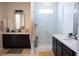 Modern bathroom with double vanity, large shower, and dark cabinetry at 862 Silverton Springs St, Henderson, NV 89011