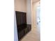 Built-in bench with storage and coat hooks in entryway at 862 Silverton Springs St, Henderson, NV 89011