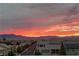 Aerial view of houses with mountain sunset view at 8620 Grove Mill Ct, Las Vegas, NV 89139