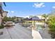 Backyard oasis with a pool, outdoor seating, and lush landscaping perfect for relaxation and entertaining at 8620 Grove Mill Ct, Las Vegas, NV 89139