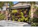 Backyard patio with fire pit and stunning vertical garden at 8620 Grove Mill Ct, Las Vegas, NV 89139