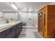 Stunning bathroom with double sinks, a sauna, and marble shower at 8620 Grove Mill Ct, Las Vegas, NV 89139