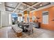 Bright dining room with wood beam ceiling and bench at 8620 Grove Mill Ct, Las Vegas, NV 89139