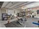 Garage converted into home gym, with various exercise equipment at 8620 Grove Mill Ct, Las Vegas, NV 89139