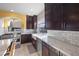 Modern kitchen features stainless steel appliances and granite countertops at 8620 Grove Mill Ct, Las Vegas, NV 89139