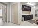 Hallway area featuring storage cabinets, sink and ample counter space at 8620 Grove Mill Ct, Las Vegas, NV 89139