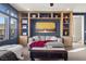 Cozy living room with custom built-ins, ample storage, and a comfortable seating arrangement at 8620 Grove Mill Ct, Las Vegas, NV 89139